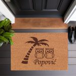 Otirač Ispod palme na obali mora